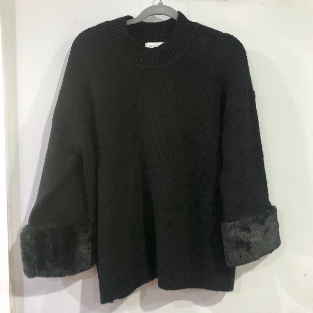 Woman’s plus sweater